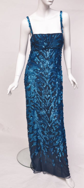 BRAND NEW   
    
ROBERTO CAVALLI 

EMBROIDERED TULLE GOWN

IT SIZE 40 - US 6

Roberto Cavalli's sapphire blue embroidered tulle gown is a sensational evening style.

Pailettes, sequins and beads. 

Made in Italy

First picture shows