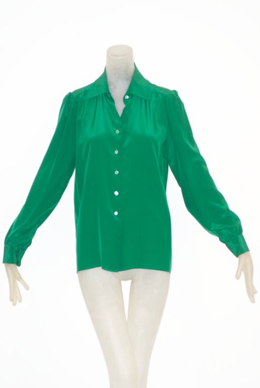 In 1978 Yves Saint Laurent said that he wanted to make 'un type parfait'.  A perfect type of essential - like a simple blouse and from season to season women could build their wardrobe around that one perfect thing.  <br />
<br />
YSL's style was