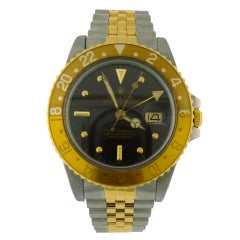ROLEX 16753 GMT Master Stainless Steel Yellow Gold Root Beer