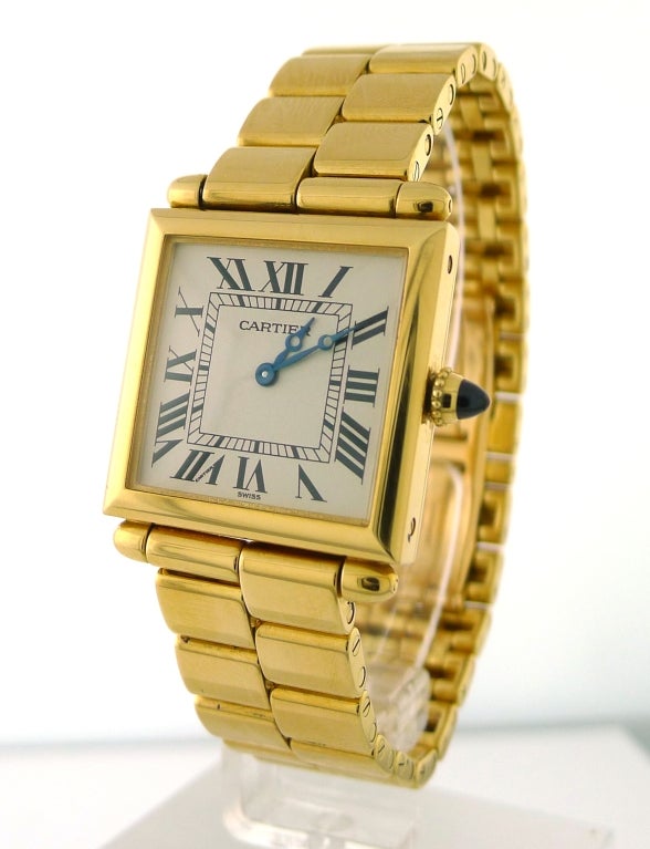 Brand Name: Cartier<br />
Series: Tank Obus<br />
Style (Gender): Unisex<br />
Case Material: 18K Yellow Gold<br />
Dial Color: White<br />
Movement: Swiss Quartz<br />
Functions: Hours, Minutes<br />
Crystal Material: Sapphire - Scratch