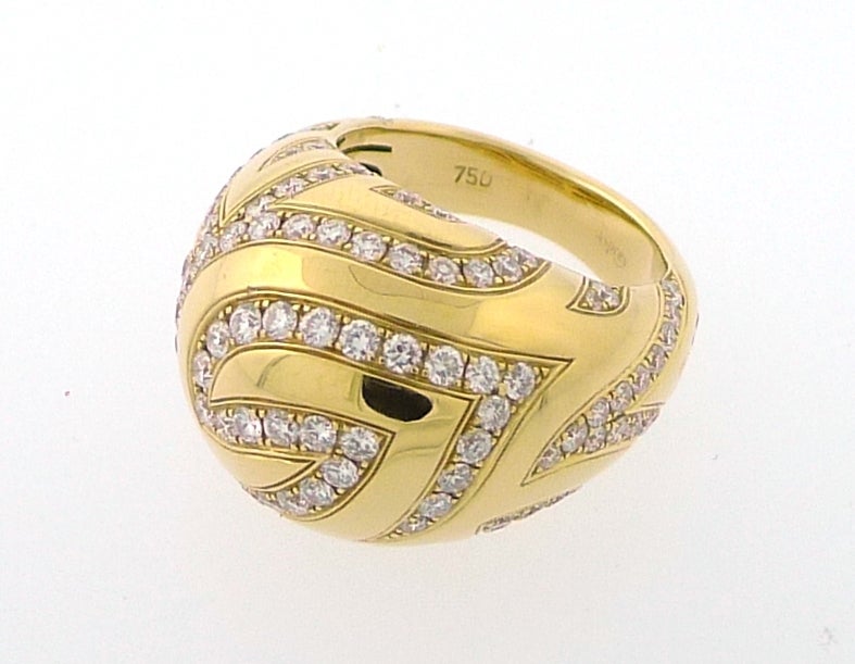 This is the Asprey 18K Yellow Gold Rib Dome Diamond Ring. It is an U.S. size 6.75 or an European size 54. It has 2.63ct worth.