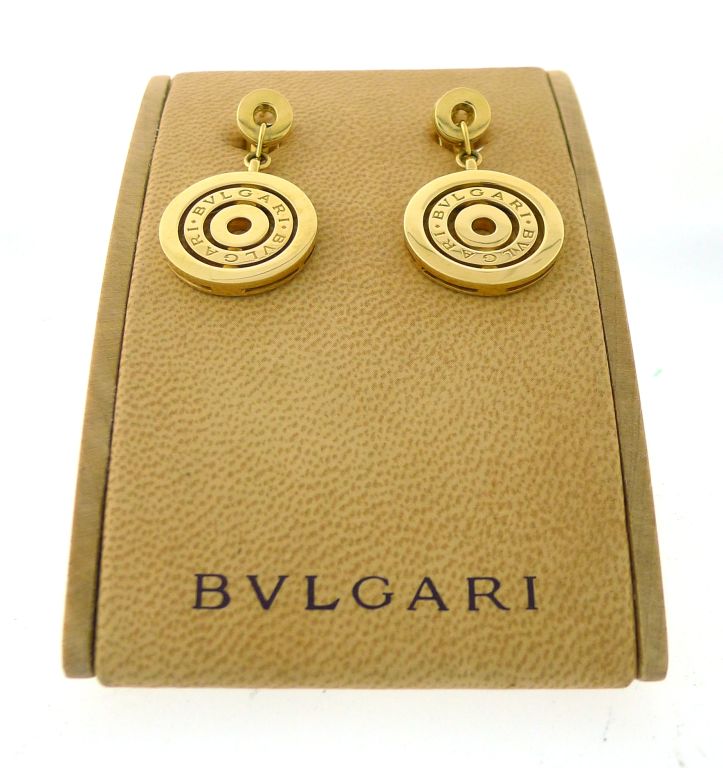 BRAND: Bulgari<br />
MODEL: Bulgari Astrale/Cerchi Earrings<br />
METAL: 18K Yellow Gold<br />
SIZE: 3/4 Inch wide<br />
WEIGHT: 10.8g each<br />
CONDITION: New with manufacturer's box