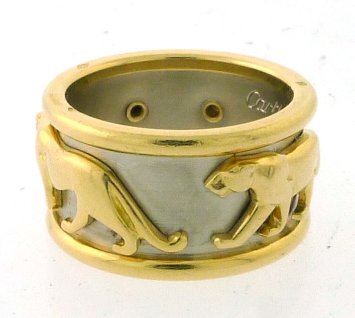 BRAND: Cartier<br />
MODEL: Panthere Ring<br />
SIZE: 56 (7.5)<br />
METAL: 18K Yellow & White Gold<br />
CONDITION: Pre-Owned with Box