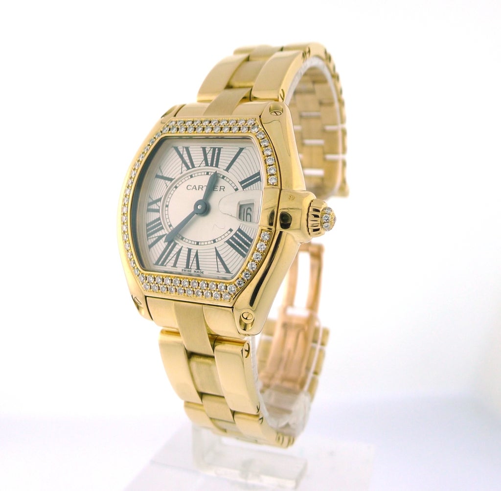 BRAND NAME:	Cartier
MODEL NUMBER:	WE5001X1
CRYSTAL:	Scratch-Resistant-Sapphire
DISPLAY TYPE:	Analog
CLASP:	Deployment Buckle
CASE MATERIAL:	Yellow Gold
BAND MATERIAL:	Yellow Gold
BAND WIDTH:	15 millimeters
DIAL COLOR:	Silver
BEZEL