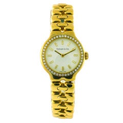 TIFFANY & CO Lady's Yellow Gold Tesoro Wristwatch with Diamond Bezel