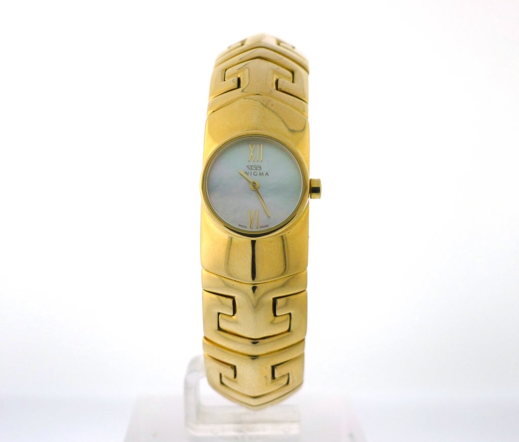 Brand Name: Enigma by Gianni Bulgari
Style Number: 1.204
Gender: Lady's
Case Material: 18K Yellow Gold
Dial Color: Mother of Pearl
Movement: Quartz
Functions: Hours, Minutes
Crystal Material: Scratch Resistant Sapphire
Case Diameter: