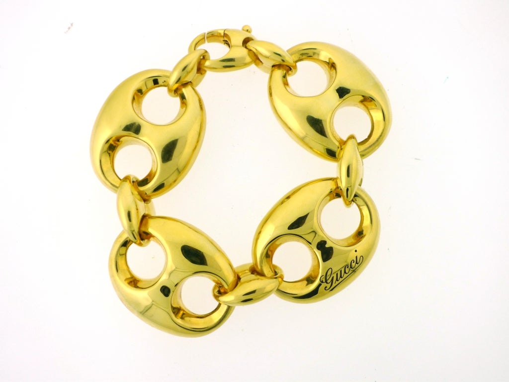 Brand Name: Gucci
Series: Mariner Anchor Chain Link Bracelet
Gender: Lady's
Material: 18K Yellow Gold
Length: Approximately 8 3/4 inches
Total Weight: 77g