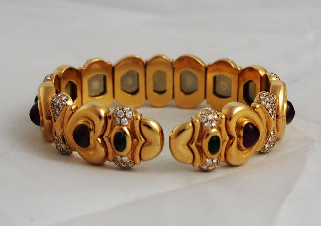 CHOPARD --- Yellow Gold Bangle set w/ Diamonds Rubies Emeralds In Excellent Condition In Los Angeles, CA