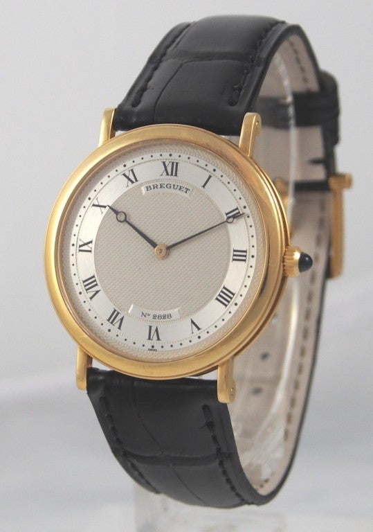 Brand Name: Breguet
Style Number: 3390BA
Also Called: Ref. 3390
Series: Classique
Gender: Men's
Case Material: 18K Yellow Gold
Dial Color: Silver w/ Guilloche
Movement: Automatic
Functions: Hours, Minutes
Crystal Material: Sapphire