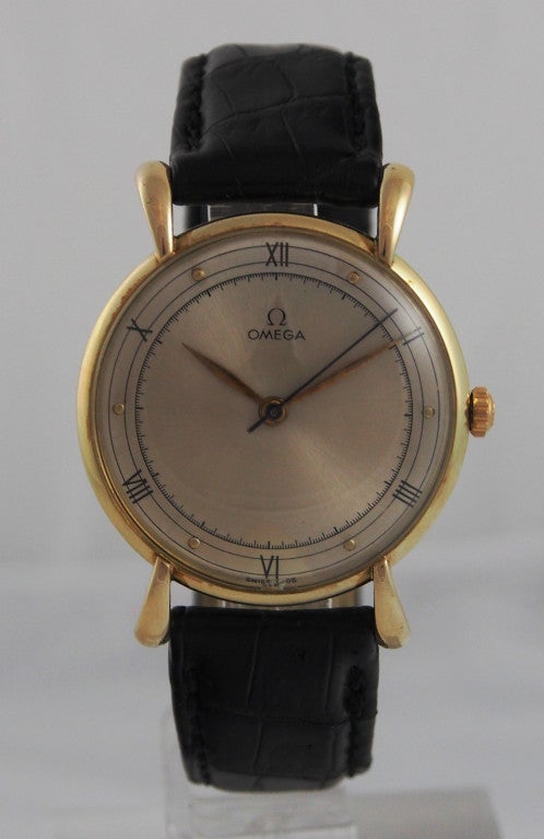 Men's Omega Yellow Gold Dress Watch with Flared Tear-Drop Lugs