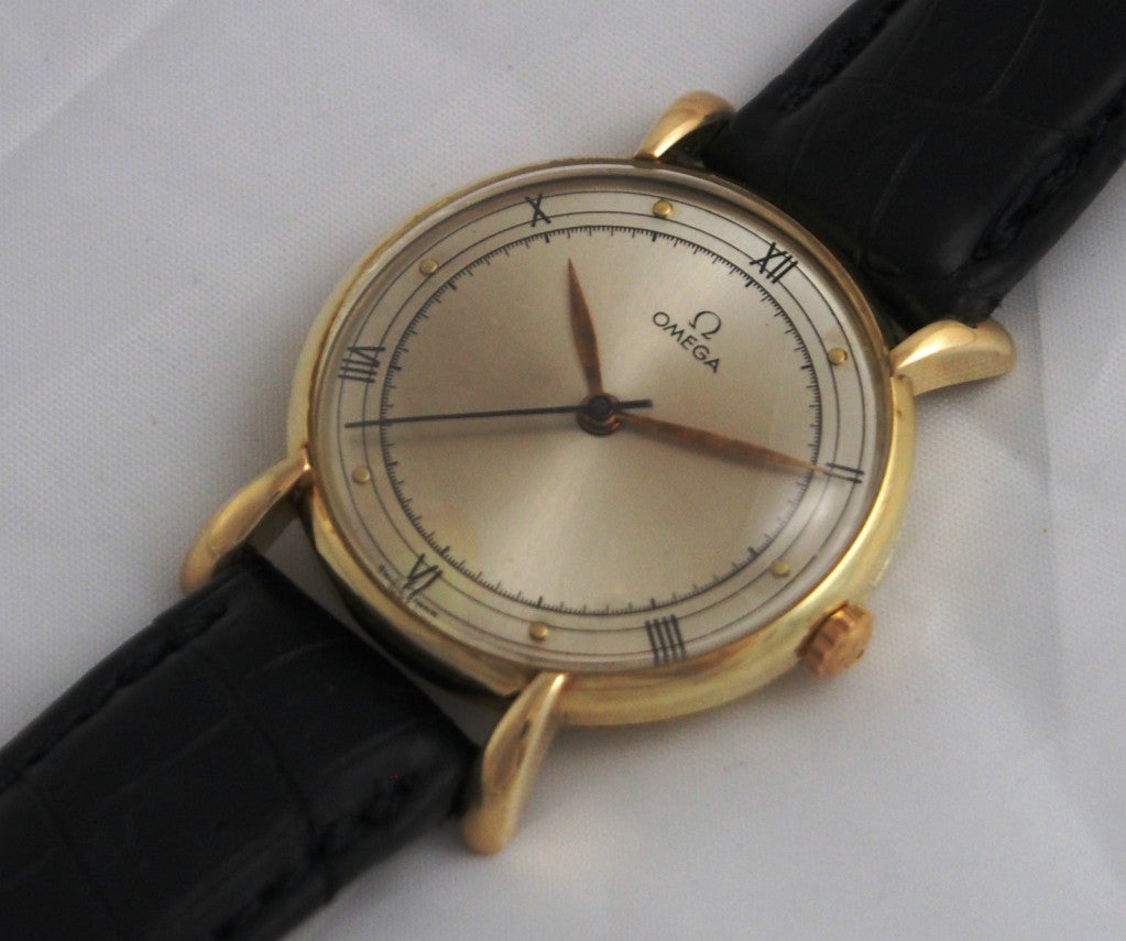 Omega Yellow Gold Dress Watch with Flared Tear-Drop Lugs at 1stDibs