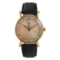 Vintage Omega Yellow Gold Dress Watch with Flared Tear-Drop Lugs