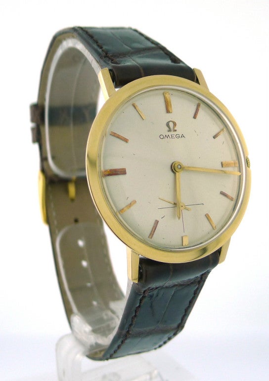 Brand Name: Omega
Style Number: H6620
Series/Year: Vintage 18K Yellow Gold Watch Manufatured in 1962
Gender: Men's
Case Material: 18k Yellow Gold (some minor scratches on the crystal as can be expected with age). Beautiful engraving on the back