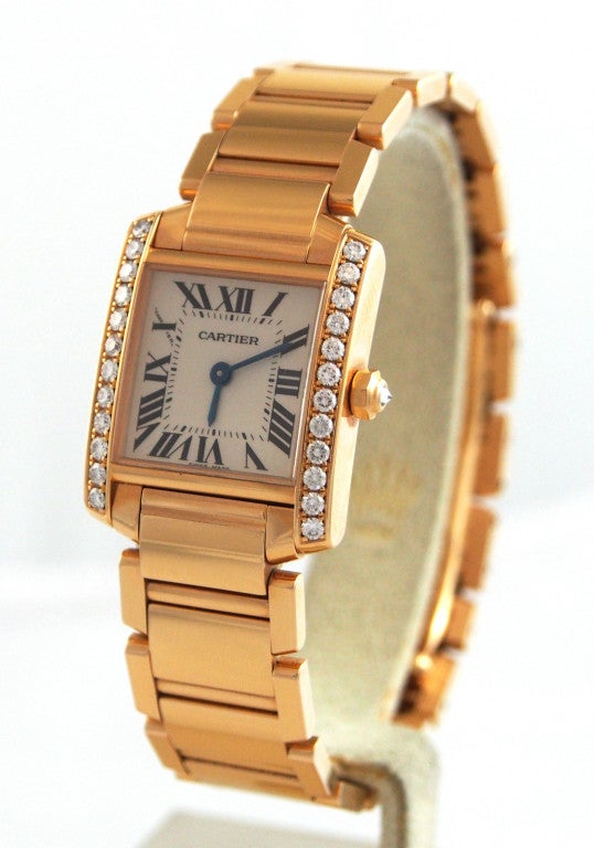 Brand Name: Cartier
Style Number: WE10456H
Series: Tank Francaise
Gender: Lady's
Case Material: 18K Rose Gold
Dial Color: White
Movement: Quartz
Functions: Hours, Minutes
Crystal Material: Scratch Resistant Sapphire
Case Diameter: