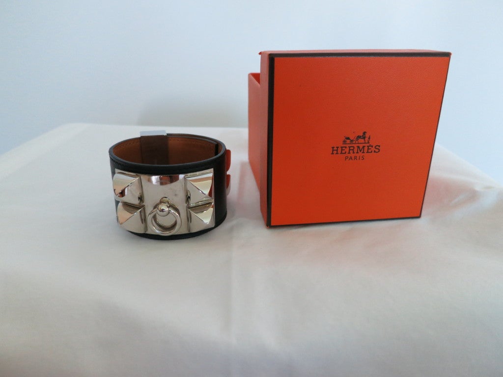 The iconic CDC bracelet preowned in black leather and PHW with box.
Every womens dream. It's classic and goes with everything.
Worn but in very good condition.