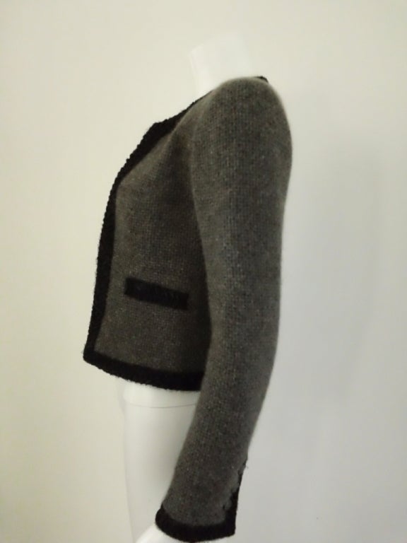 Women's Chanel grey with black trim jacket