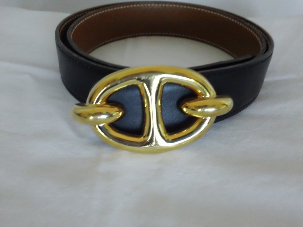Hermes equestrian buckle with blk/tan strap
