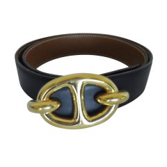 Hermes equestrian buckle with blk/tan strap