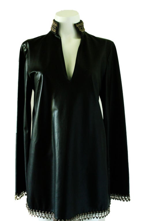 This show stopper leather tunic, or for some people can be worn as a dress. The Chrome Hearts silver detailing around the neck, sleeves and bottom makes you speechless just looking at it. It's like a piece of art. Match it with leggings, straight