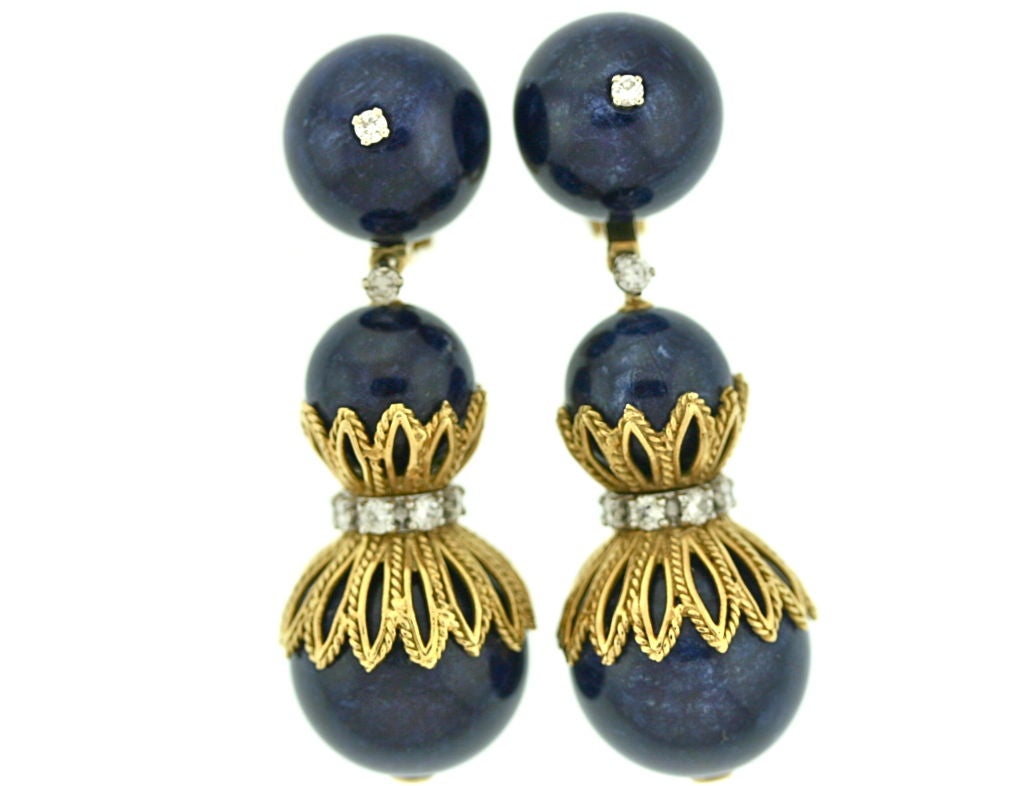 French lapis bead ear clips with textured 18k gold set with diamonds. The wonderful movement of these ear clips makes them feel young and festive while the French design and craftsmanship lend elegance and sophistication. Circa 1960s