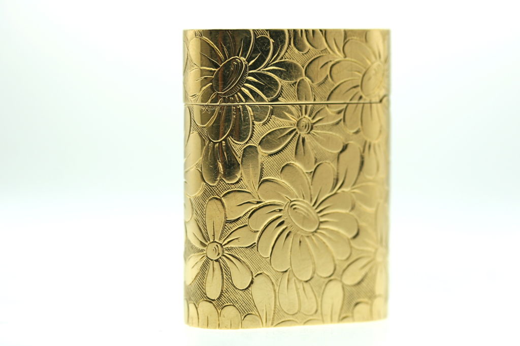 The height of elegance...an 18k gold and diamond lighter from the Van Cleef & Arpels 
