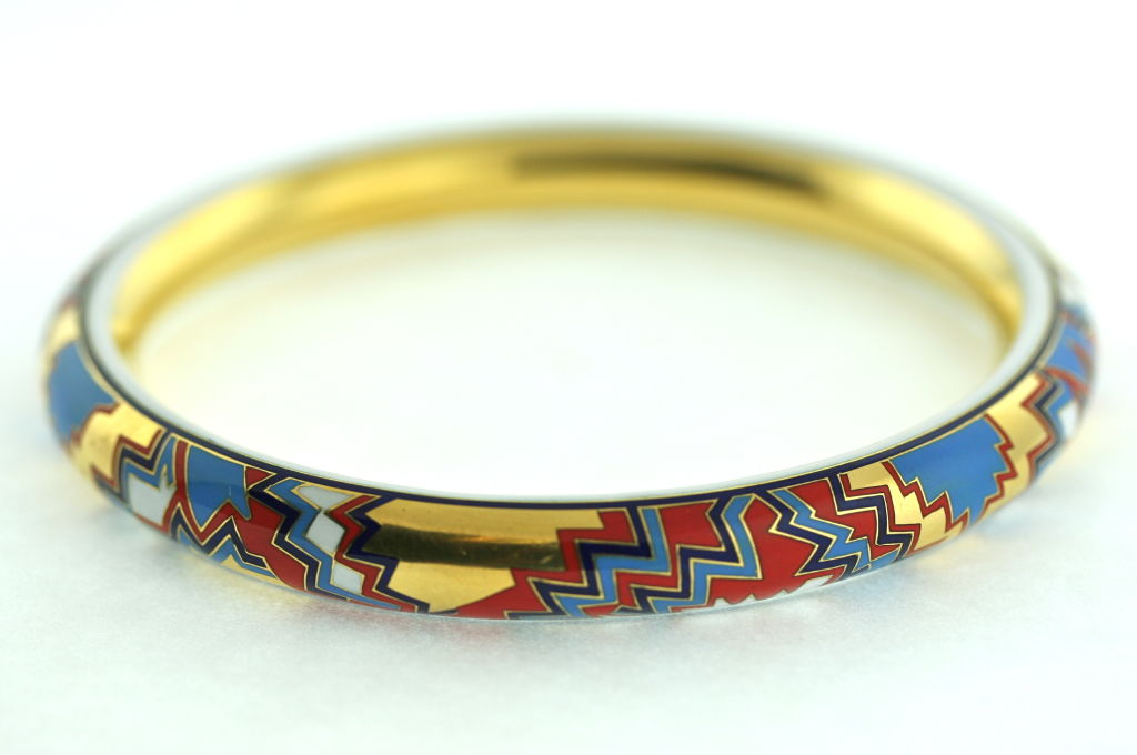 A museum quality, very special and unusual Cartier Paris 18k gold enamel armlet. The beautiful enamel work on this piece is a wonderful reflection of the geometric and graphic essence of art deco design. The palette and execution are reminiscent of