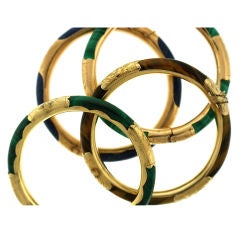 Set of Four Etched Gold and Hard Stone Bangles