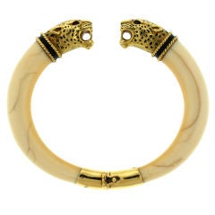 Bracelet jonc français en or et ivoire à tête de léopard confronté