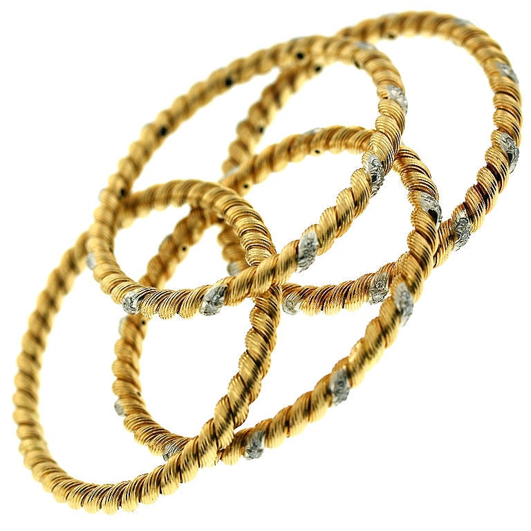 VAN CLEEF & ARPELS Set Of Gold and Diamond Bangle Bracelets