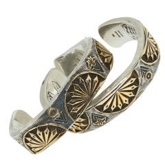 Pair of Native American Silver and Gold Cuffs