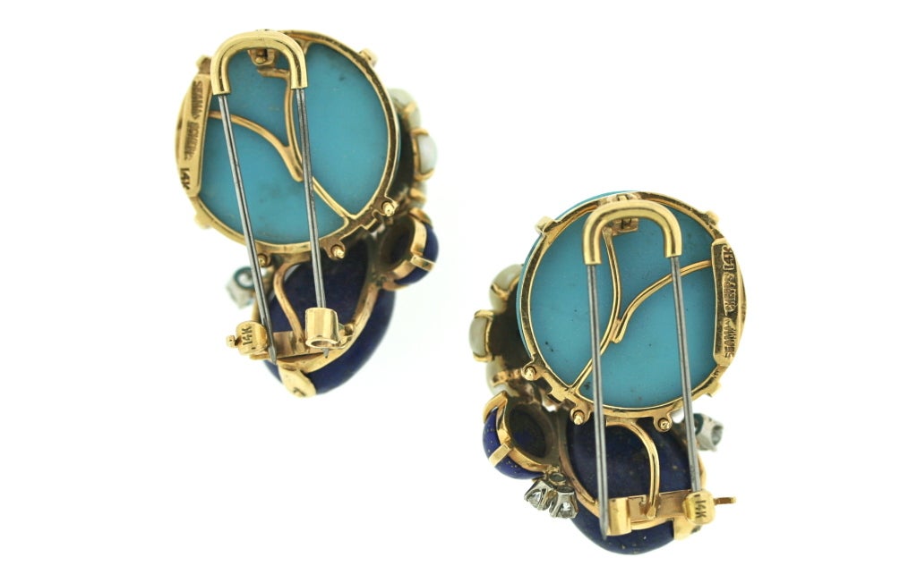 Seaman Schepps pair of 14k gold dress clips designed as a bouquet floral motif with cabochon turquoise and lapis stones with a flower of pearl petals and nine interspersed diamonds. Signed SEAMAN SCHEPPS 14k