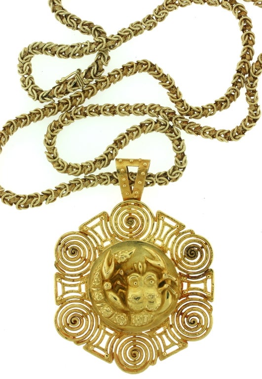 Van Cleef & Arpels 18k textured gold Scorpio zodiac medallion of a hexagonal shape suspended by a VCA 14k gold matching long neck chain. This is the first zodiac pendant of this design I have ever seen...a wonderful 1970s statement! Both pendant and