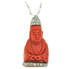Carved Coral and Diamond Buddha Necklace
