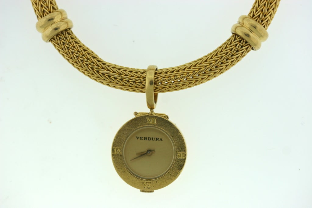 Verdura 18k woven gold bracelet suspending a matching pendant watch charm. This is a most useful piece for pairing with bangles, cuffs or link bracelets and serves as both a fully functional time piece as well as a beautifully decorative piece of