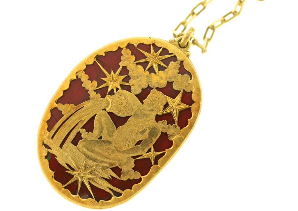 Buccellati 18k brushed gold aquarius zodiac pendant mounted on a beautiful jasper stone of a russet color measuring 2.75