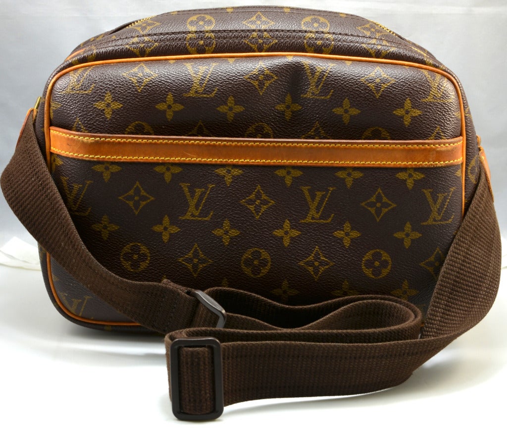 This is a great discontinued monogram Vuitton bag.  It can be worn by a woman or man.  It had an adjustable strap enabling the wearer to use as a shoulder or crossbody bag. Lots of zippered and un zippered compartments makes this the perfect