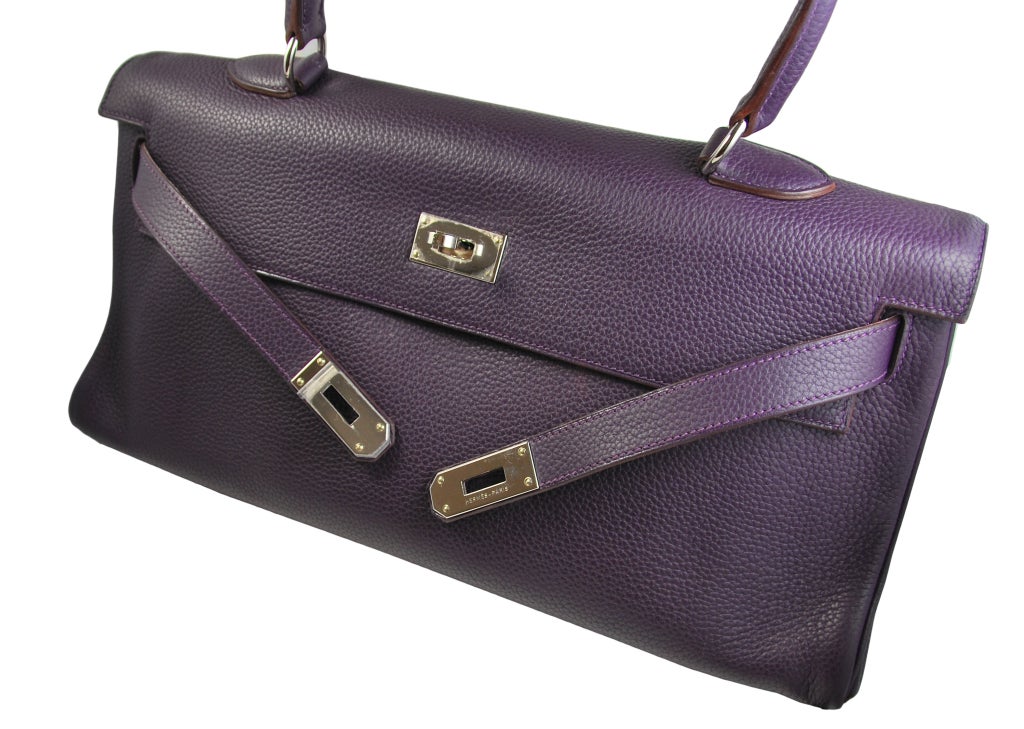 HERMES KELLY BAG JPG (JEAN PAUL GAUTIER) SHOULDER IN RAISIN WITH SILVER HARDWARE 42CM. iNCLUDES LOCK/KEY and DUST COVER. UNFORTUNATELY, NO BOX. . 


PLEASE VIEW ALL PHOTOS. THE BAG IS IN EXCELLENT PRE-OWNED CONDITION.