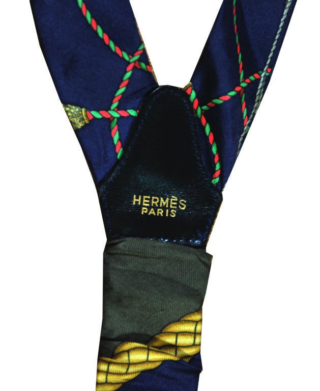 Fabulous Hermes vintage suspenders.  Silk and leather.  Timeless classic!

For further detailed information regarding this superb pair of suspenders, please feel free to contact us at 201-314-5033.