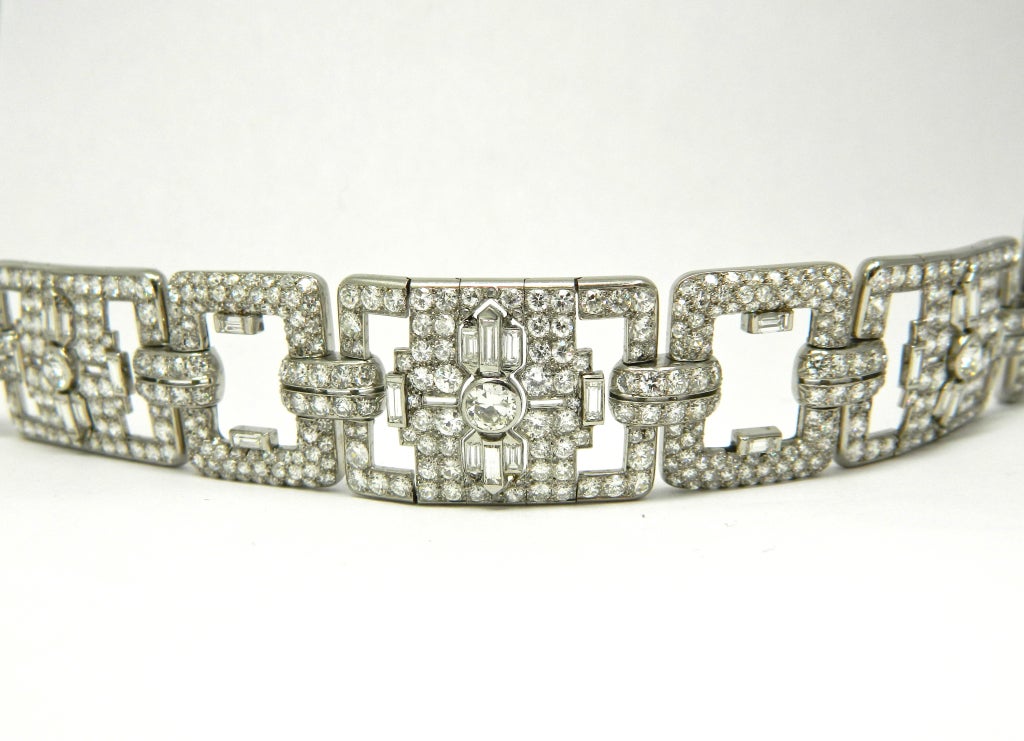 A fine and rare Platinum and Diamond Art Deco Bracelet by Mauboussin Paris.  A beautiful Art Deco design containing over 30.00cts of fine diamonds.  Accompanied by it's original fitted box and Mauboussin archive papers.  Truly a one of a kind