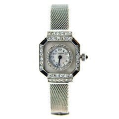 CARTIER, Art Deco Platinum, Diamond, Onyx and Rock Crystal Watch