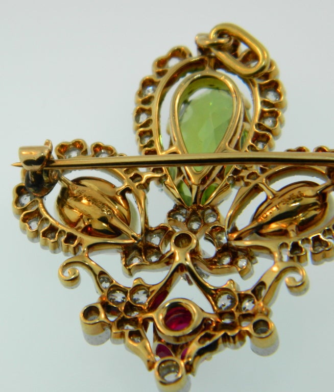 Stunning, Platinum topped gold, Peridot, Diamond, Burma Ruby, and Natural Pearls brooch/pendant by J.E. Caldwell & Co.  Signed and numbered