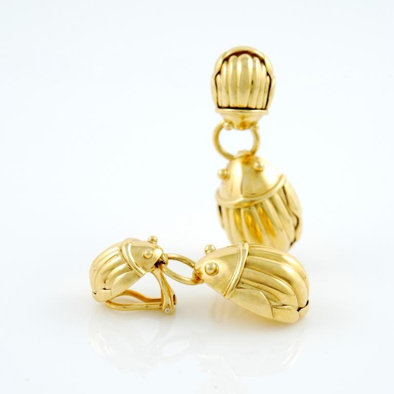 18kt yellow gold drop earrings made in  in the form of two opposing scarabs joined by a ring, signed Tiffany & Co. circa 1993.
