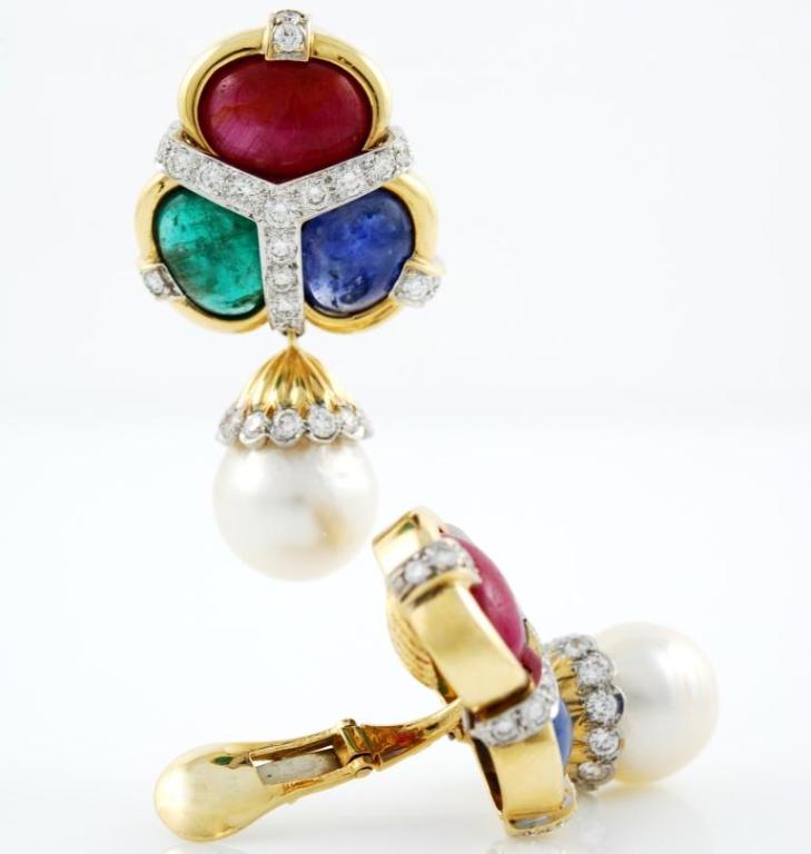 18kt yellow gold David Webb earclips set with diamonds, two South Sea pearls and cabochon rubies, sapphires and emeralds.