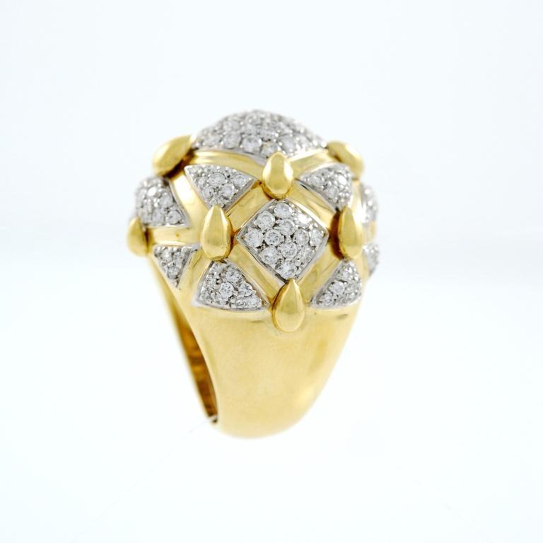 18kt yellow gold  dome ring with diamond set in platinum.
