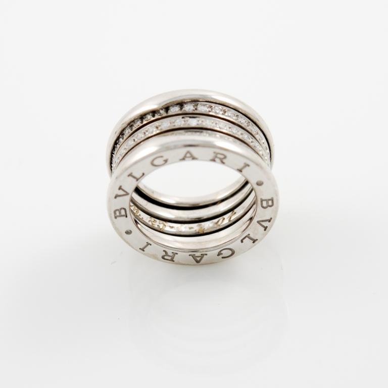 18kt white gold and pavè diamonds 4 band ring by Bulgari, contemporary. Size 8 (Italy), 4.5 (US)