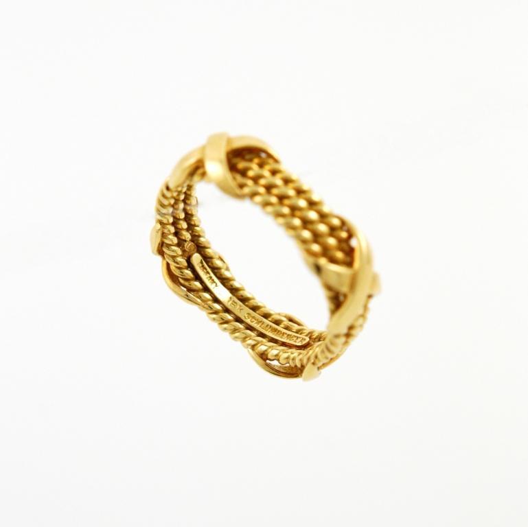 18kt yellow gold Rope three-row X ring, Schlumberger for Tiffany & Co. 1990's, size 7.1/4