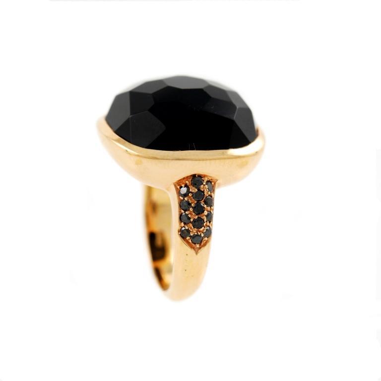 18kt pink gold ring featuring a faceted onyx and 0.39 carats of black diamonds. Italy, 2000's