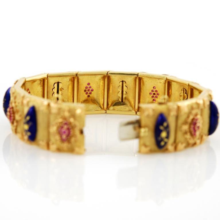 18kt yellow gold, blue enamel and ruby bracelet, Italy, 1970's. 