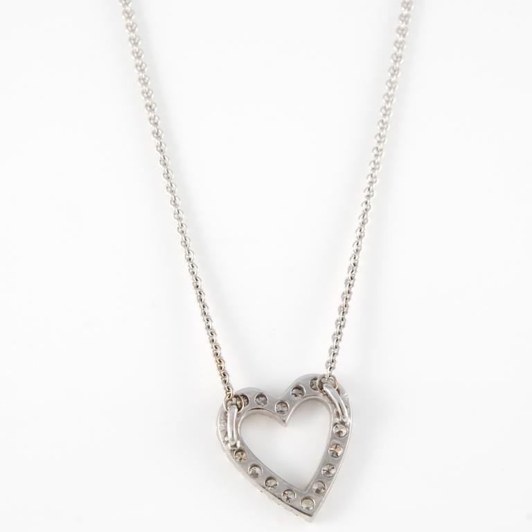 18kt white gold necklace and heart pendant featuring approximately 1.80ct of diamonds. 1990's