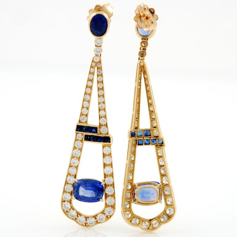 Beautiful pair of 18kt pink gold, diamonds and sapphire earrings hand-made in Italy. The Ceylon sapphires weight approximately 5.5 carats in total, surrounded by 84 diamonds weighting approximately 2 carats.